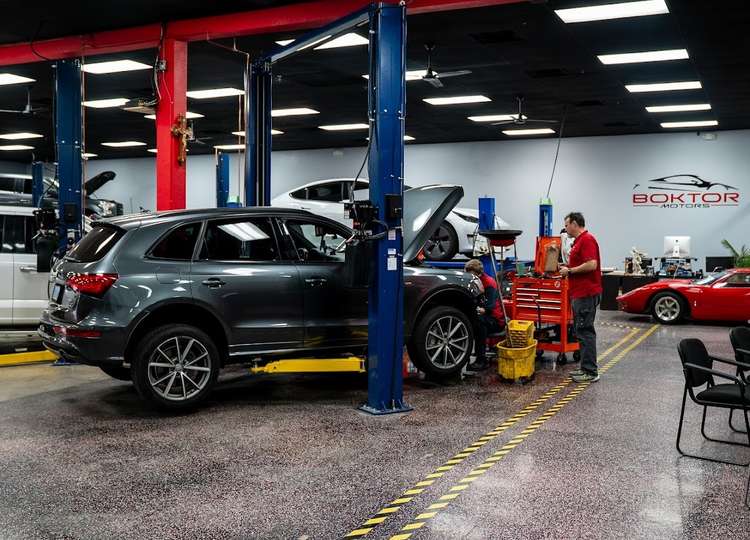 Vehicles being serviced inside Boktor Motors’ repair facility